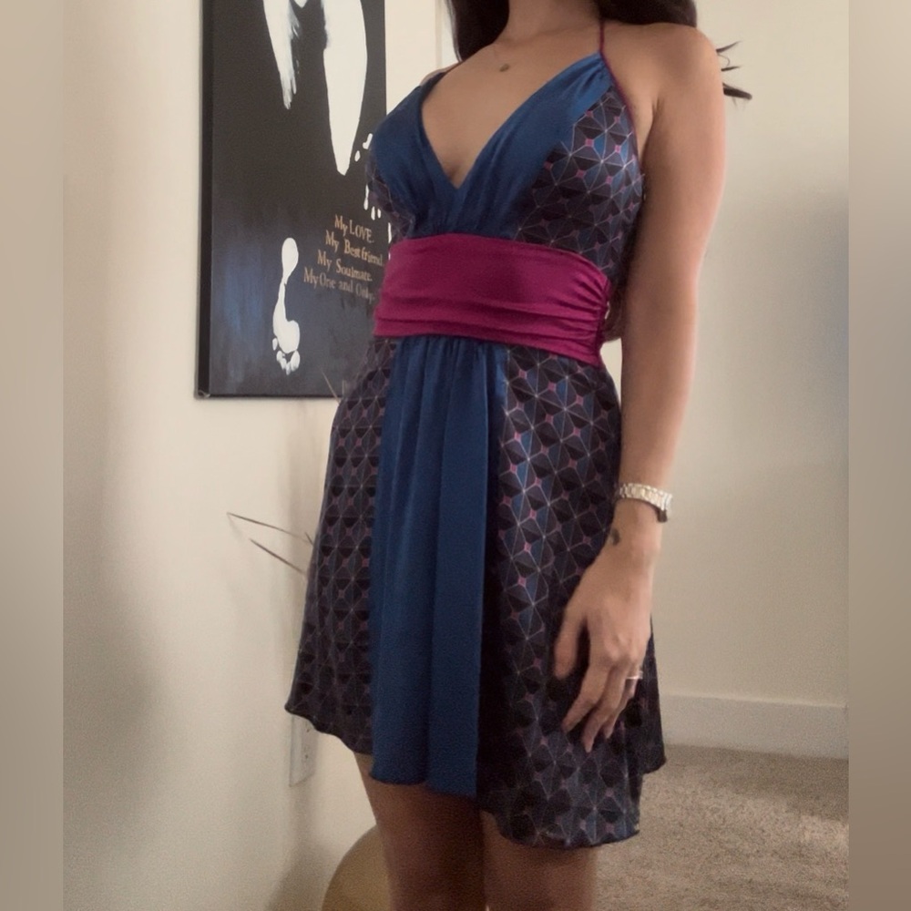 Short Bebe silk blue print with fuchsia waist. 
Perfect Artsy night out dress .